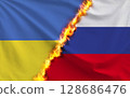 Ukrainian and Russian flags 128686476
