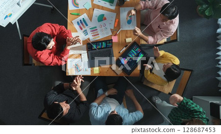 Smart team discuss about Ux Ui design while putting hand together. Convocation. Smart team discuss about Ux Ui design while putting hand together. Convocation. 128687453