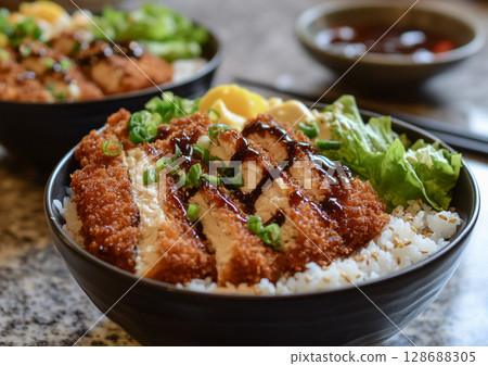 Katsu breaded and fried cutlet slices with rice and egg in bowl plate.AI Generative. 128688305