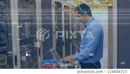 Image of glitch over caucasian man checking servers Image of glitch over caucasian man checking servers 128688713