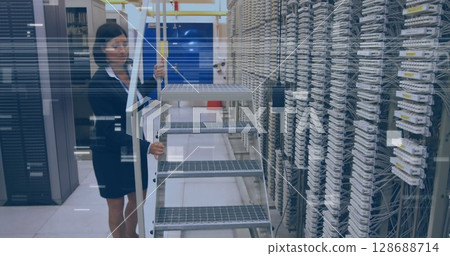 Image of glitch over caucasian woman checking servers 128688714