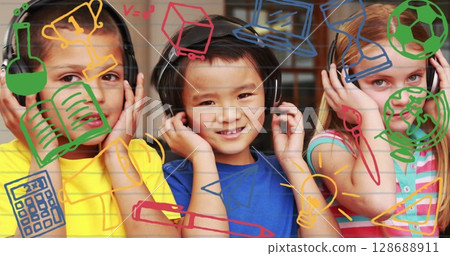 Image of school icons over diverse schoolchildren in classroom Image of school icons over diverse schoolchildren in classroom 128688911
