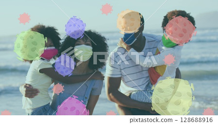 Image of virus cells over african american family with face masks on sunny beach Image of virus cells over african american family with face masks on sunny beach 128688916