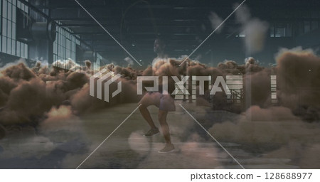 Image of clouds over african american sportsman exercising Image of clouds over african american sportsman exercising 128688977