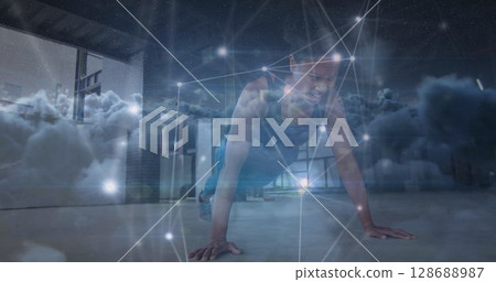 Image of clouds over african american sportswoman exercising Image of clouds over african american sportswoman exercising 128688987