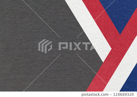 Abstract black textured paper background with white, red, blue geometric lines, copy space for graphic banner template Abstract black textured paper background with white, red, blue geometric lines, copy space for graphic banner template 128689320