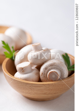 White Button mushroom or Champignon mushroom (Agaricus bisporus), Food ingredient White Button mushroom or Champignon mushroom (Agaricus bisporus), Food ingredient 128689607