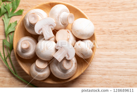 White Button mushroom or Champignon mushroom (Agaricus bisporus), Food ingredient 128689611