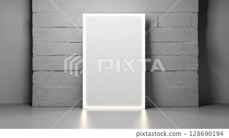 Illuminated blank rectangular frame on textured concrete wall with soft reflection Illuminated blank rectangular frame on textured concrete wall with soft reflection 128690194