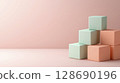 Isometric cubes in muted pastel tones stacked on clean surface with soft lighting 128690196