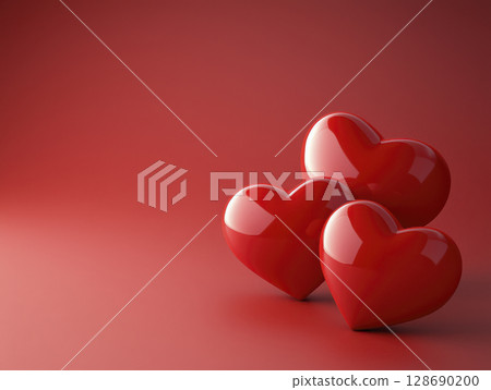 Glossy red heart shapes grouped on smooth red background with romantic feeling Glossy red heart shapes grouped on smooth red background with romantic feeling 128690200