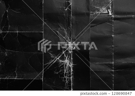 Old black paper background with wrinkles and scuffs on the folds and grunge surface. Dark abstraction. Cardboard rough backdrop Old black paper background with wrinkles and scuffs on the folds and grunge surface. Dark abstraction. Cardboard rough backdrop 128690847