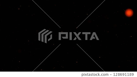 Image of orange dots floating on black background Image of orange dots floating on black background 128691189