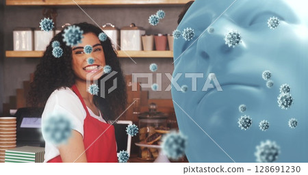 Smiling barista serving at café counter with display case and virus particles, copy space 128691230