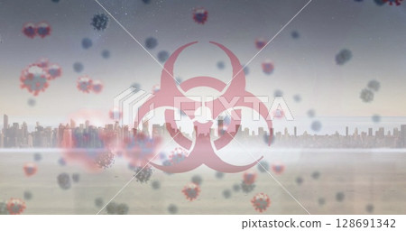 Image of covid 19 cells and biohazard symbols over cityscape 128691342