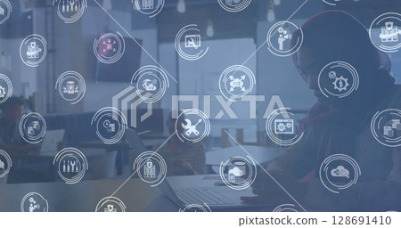 Image of connections with technology icons over biracial woman using smartphone 128691410