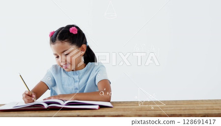 Image of math formulas over happy biracial girl doing homework Image of math formulas over happy biracial girl doing homework 128691417