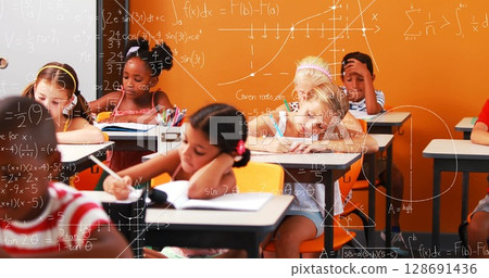 Image of math formulas over class of diverse children learning at school 128691436
