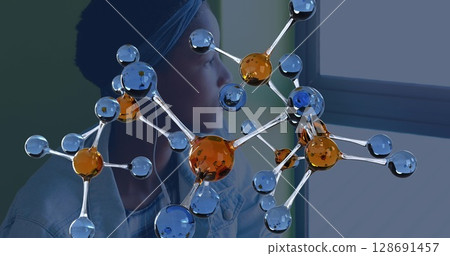 Image of molecules over african american woman with earphones using smartphone Image of molecules over african american woman with earphones using smartphone 128691457