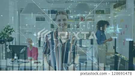 Image of financial data processing over diverse business people in office and cityscape 128691478