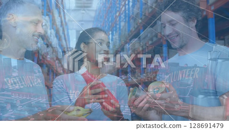 Image of computer circuit board and network of connections over diverse people in warehouse e Image of computer circuit board and network of connections over diverse people in warehouse e 128691479