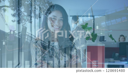 Image of financial data processing over diverse business people in office and cityscape Image of financial data processing over diverse business people in office and cityscape 128691480