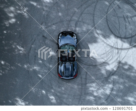 Aerial view of a shiny black convertible Aerial view of a shiny black convertible 128691701