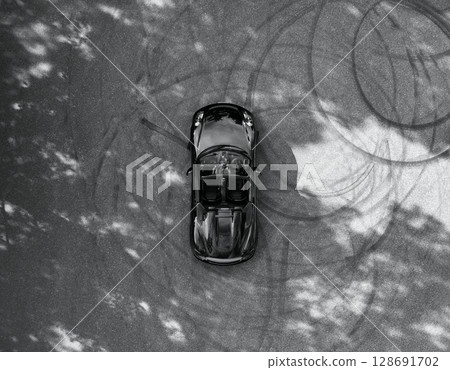 Aerial view of a shiny black convertible 128691702