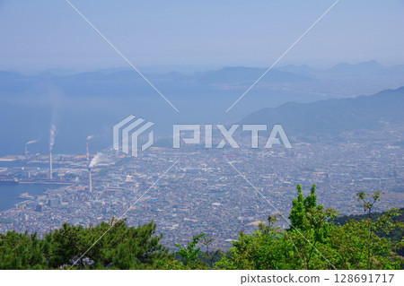 View of Kawanoe city, Kanonji city and Shonai Peninsula from Suihamine Observatory in Shikokuchuo City, Ehime Prefecture 128691717