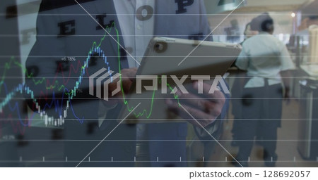 Image of data processing and letters over caucasian businessman using tablet Image of data processing and letters over caucasian businessman using tablet 128692057