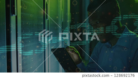 Image of data processing over african american male worker in server room Image of data processing over african american male worker in server room 128692176