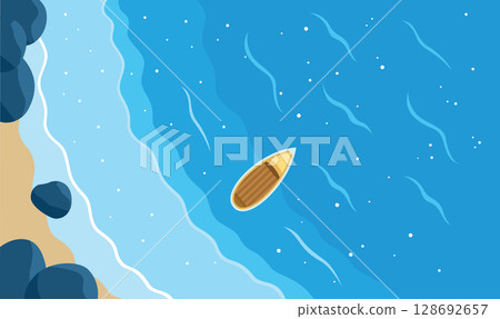 Aerial View of Ocean Waves Meeting Shoreline. With a Lone Boat Floating Near the Water's Edge 128692657