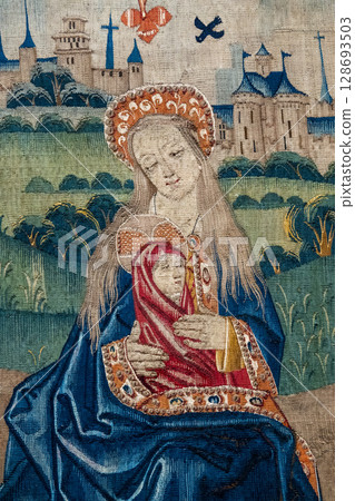 Mary holding baby Jesus 128693503
