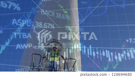 Image of financial data processing over wind turbine 128694680