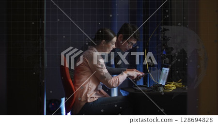 Image of data processing over diverse workers in server room Image of data processing over diverse workers in server room 128694828