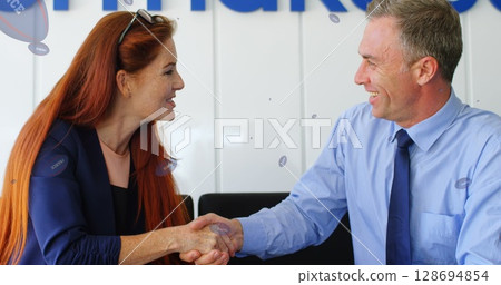 Image of rugby balls with france text over caucasian business people shaking hands Image of rugby balls with france text over caucasian business people shaking hands 128694854