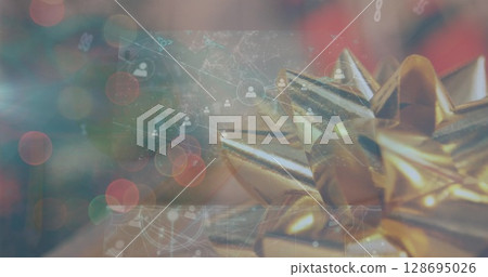 Image of data processing on screens over christmas present Image of data processing on screens over christmas present 128695026