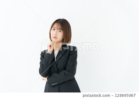 Business woman, young woman, worried Business woman, young woman, worried 128695067