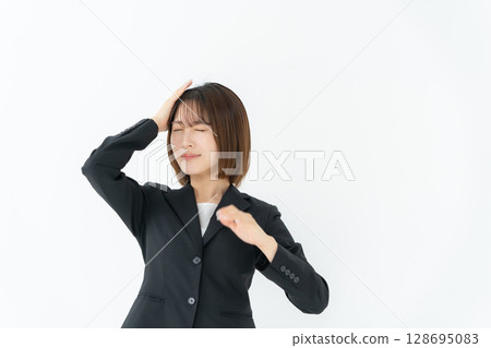 Business woman, young woman, worried Business woman, young woman, worried 128695083