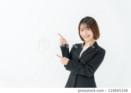 女商人，年輕女子，指著 128695106