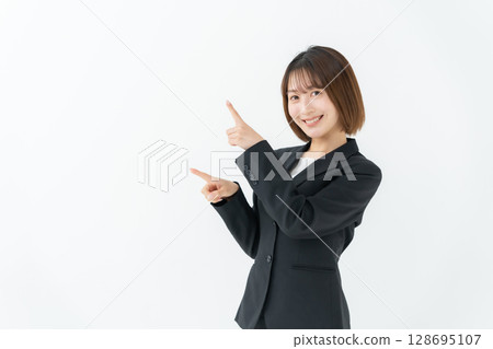 女商人，年輕女子，指著 128695107