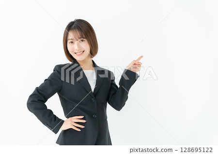 女商人，年輕女子，指著 128695122