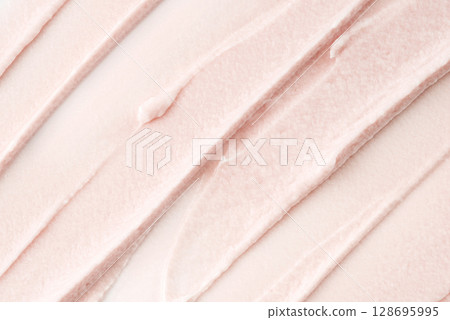 The texture of a pink cream or scrub 128695995