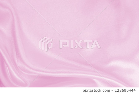 Smooth elegant pink silk or satin texture as wedding background. Luxurious background design 128696444