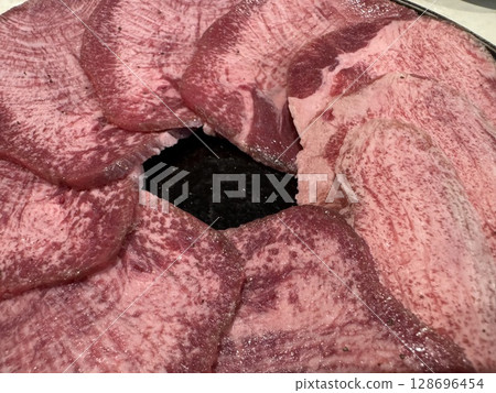Thinly sliced beef tongue Thinly sliced beef tongue 128696454