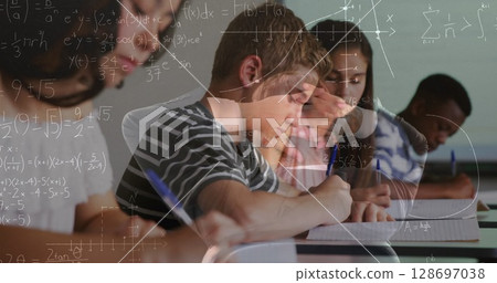 Image of math formulas moving over class of diverse pupils learning at school 128697038
