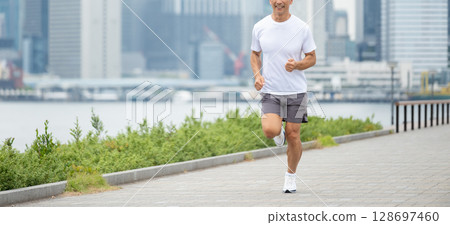 Jogging man's feet 128697460