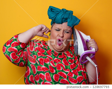 Colorful Woman Holding Iron and Shouting with Funny Expression 128697793