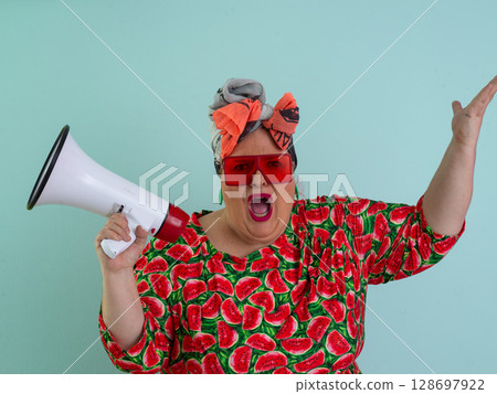 Colorful Retro Woman Shouting Through a Megaphone Colorful Retro Woman Shouting Through a Megaphone 128697922