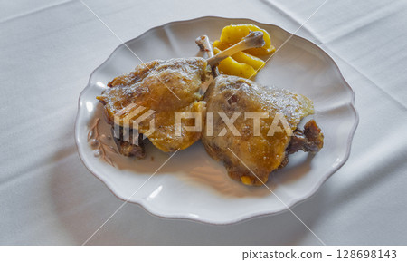 Baked Duck Legs with Potatoes, Spain 128698143